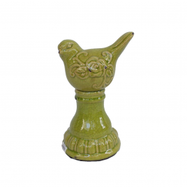 Green ceramic bird on the stand
